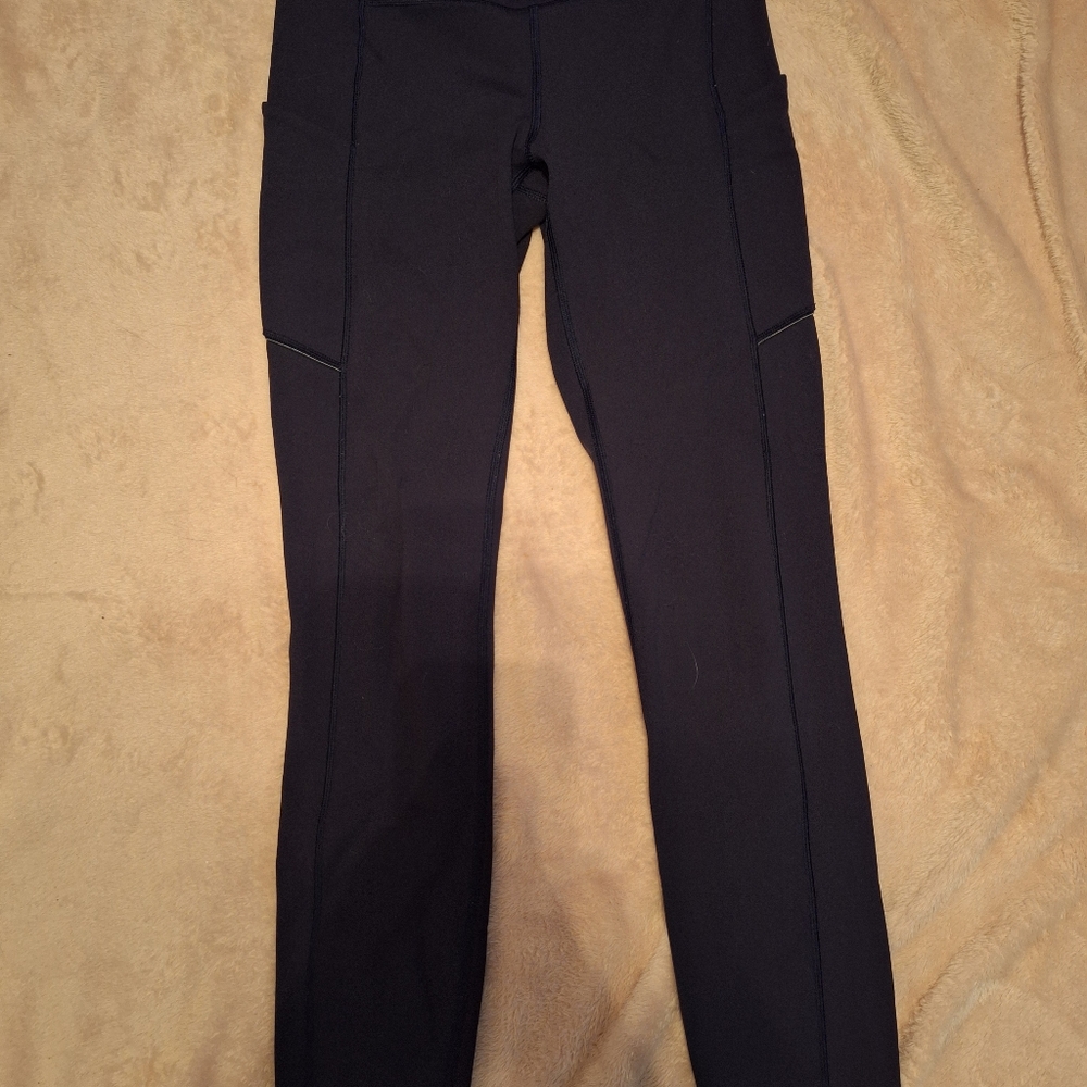 Lululemon, Back on track leggings, size 4, Navy blue, low-rise, slight stretch.